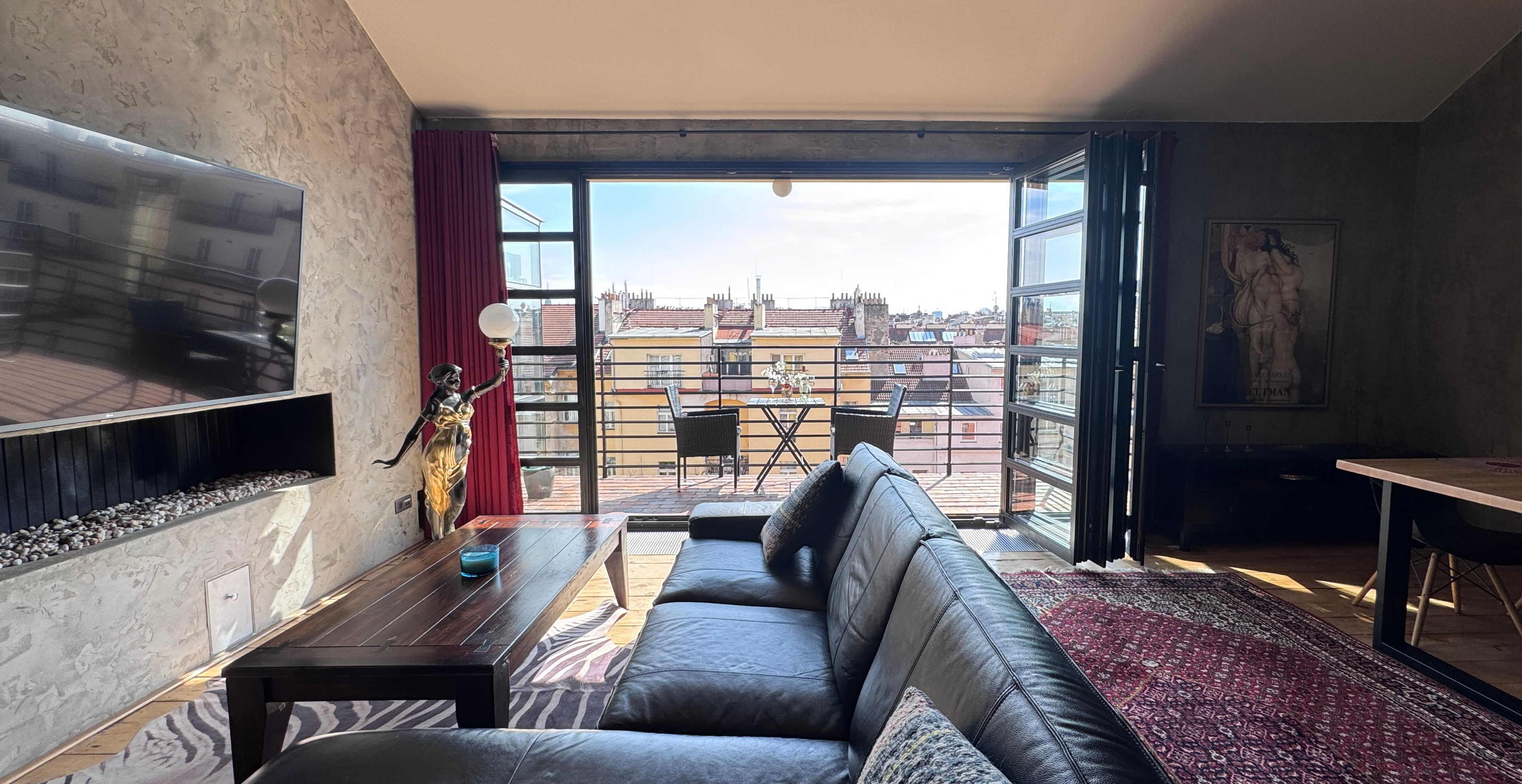 Indoor-outdoor terrace of Polska Penthouse in Vinohrady — seamless transition from living space to private garden